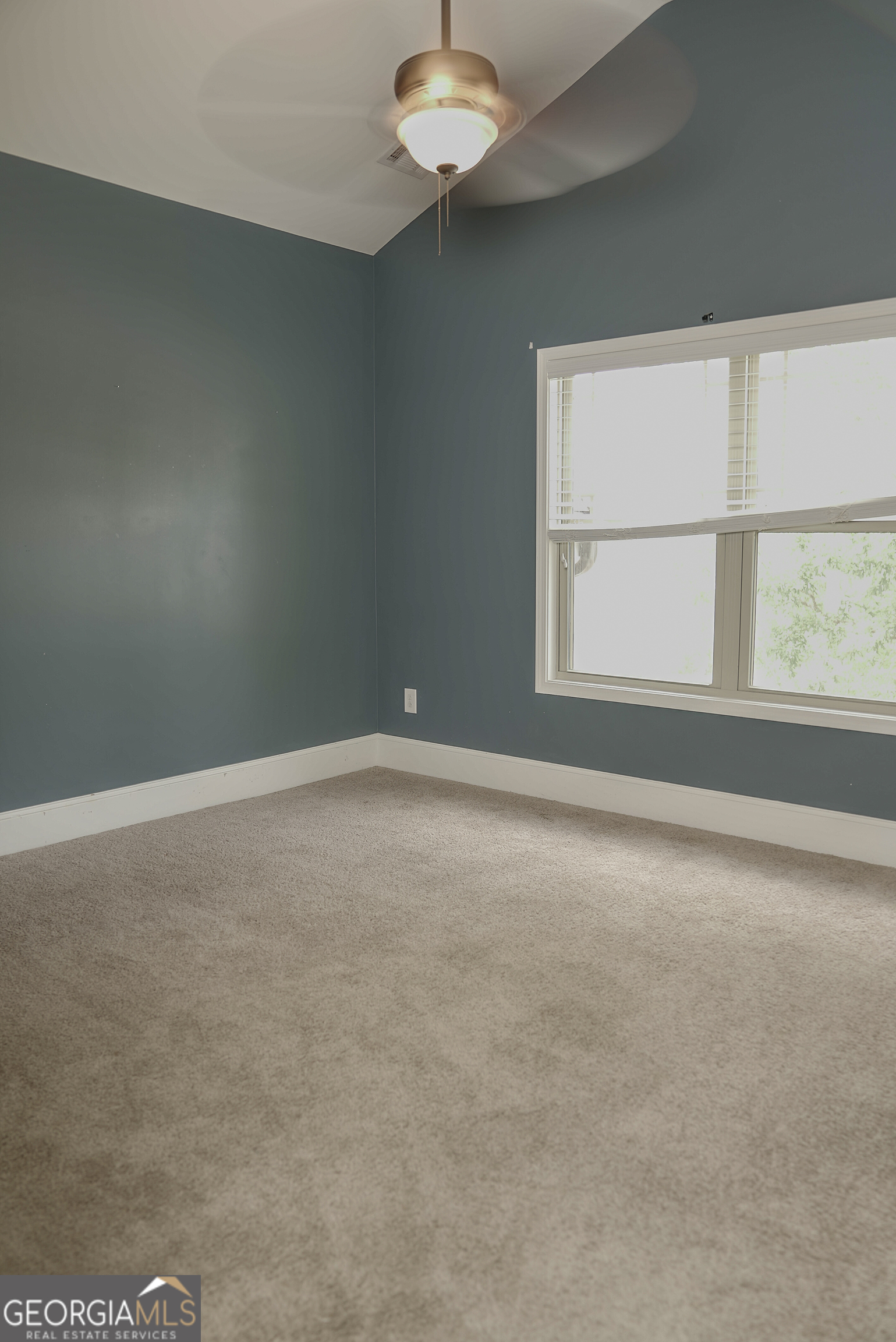 505 Mirror Lake Parkway Villa Rica, GA 30180 - Photo 24 of 28 an empty room with a window