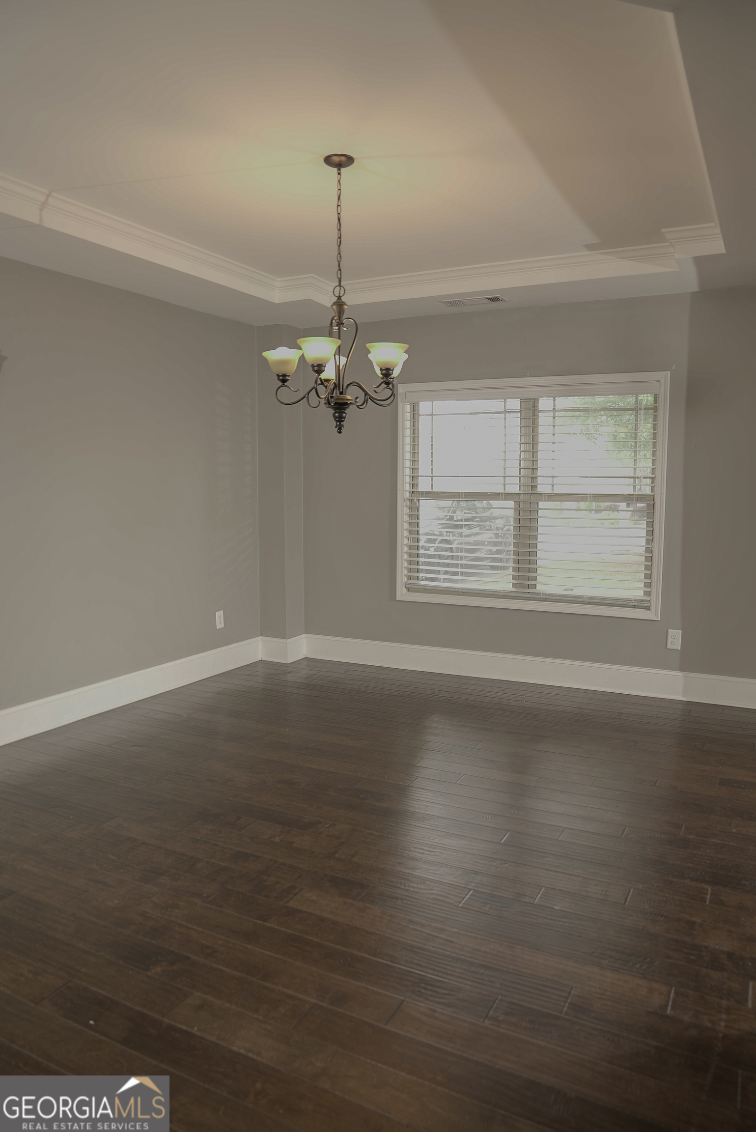 505 Mirror Lake Parkway Villa Rica, GA 30180 - Photo 3 of 28 a view of wooden floor chandelier and window in a room