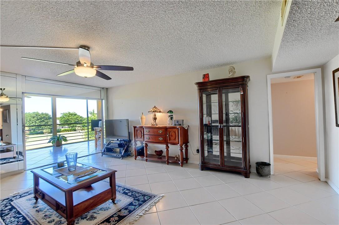 9165 Southwest 14th Street, Unit 1509 Boca Raton, FL 33428 - Photo 14 of 23 Beautiful Matching Tile Throughout!