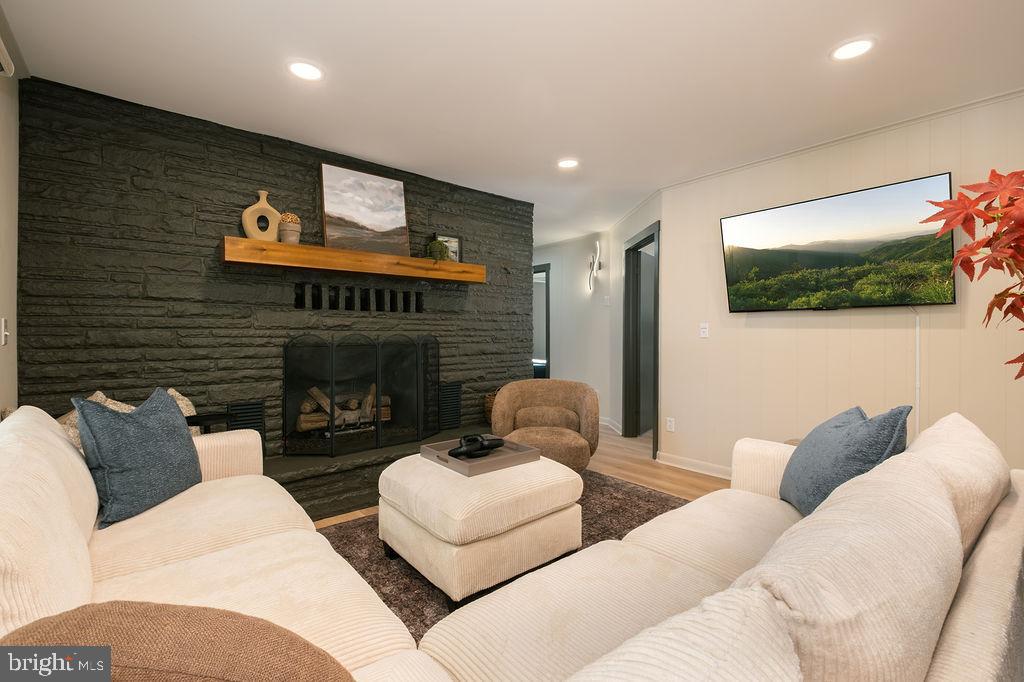1321 Marsh Hill Road McHenry, MD 21541 - Photo 14 of 42 a living room with furniture and a flat screen tv