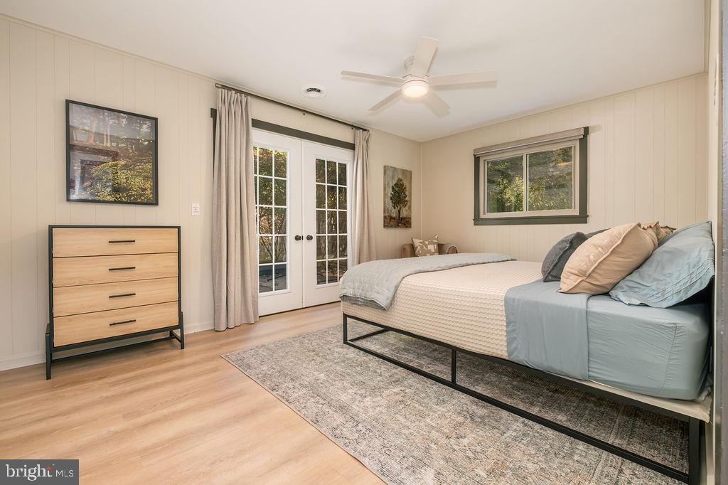 1321 Marsh Hill Road McHenry, MD 21541 - Photo 23 of 42 a bedroom with a bed and a dresser