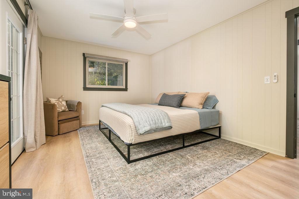 1321 Marsh Hill Road McHenry, MD 21541 - Photo 24 of 42 a bedroom with a bed and a couch