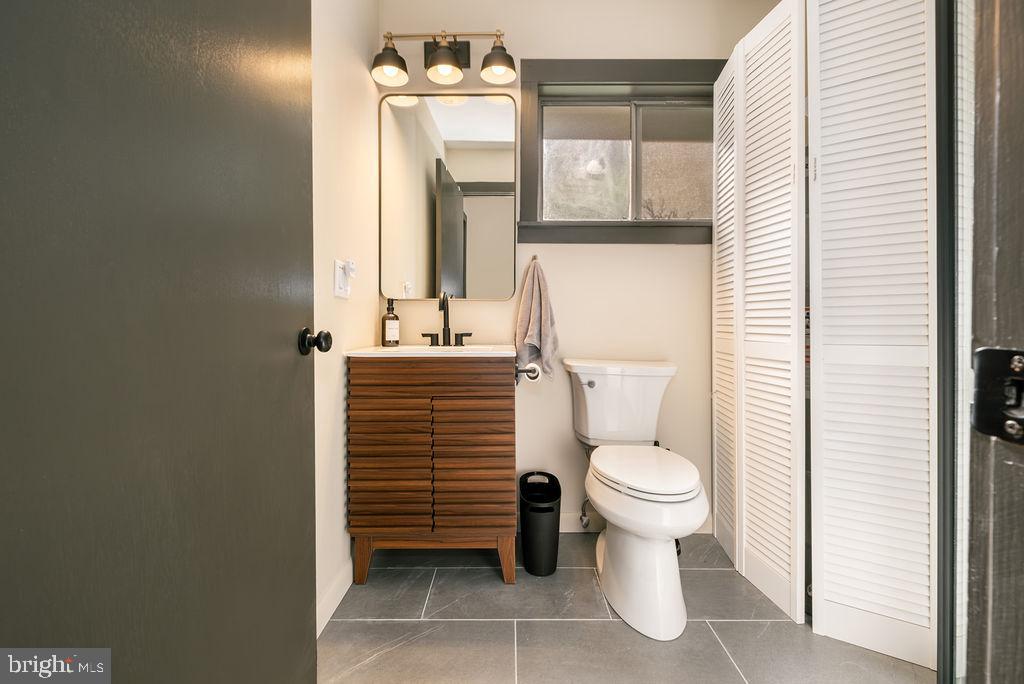 1321 Marsh Hill Road McHenry, MD 21541 - Photo 28 of 42 a bathroom with a toilet sink and mirror