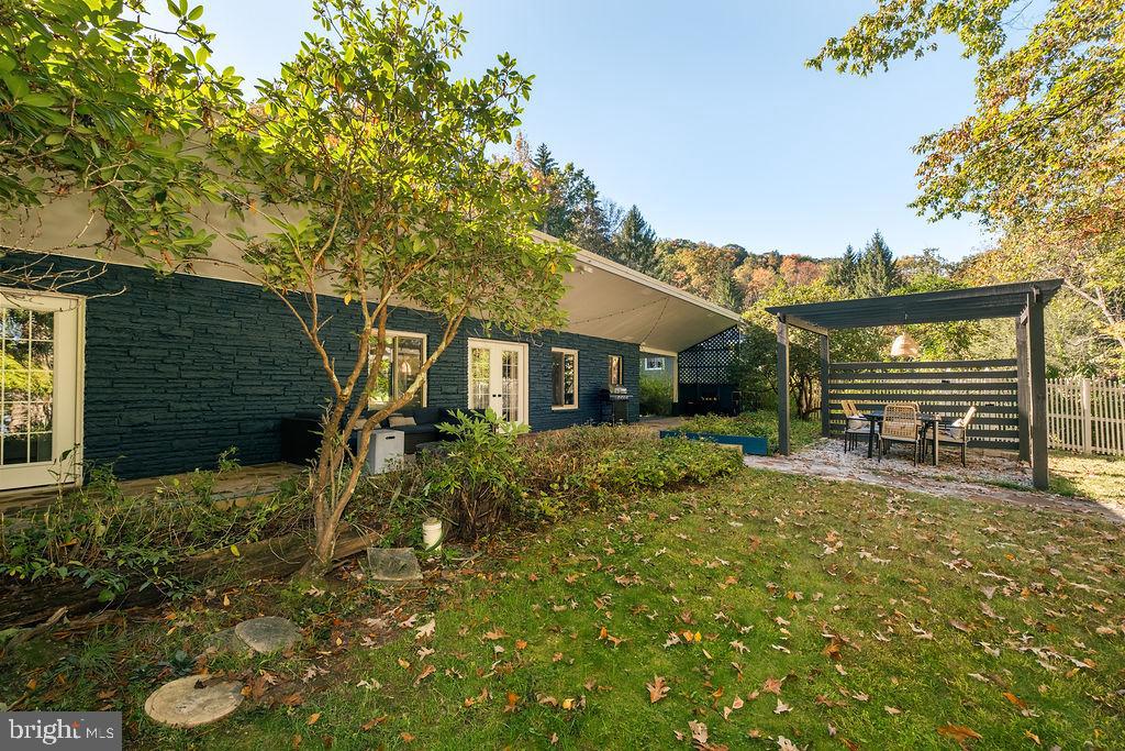 1321 Marsh Hill Road McHenry, MD 21541 - Photo 36 of 42 a view of house that has a small yard and large trees