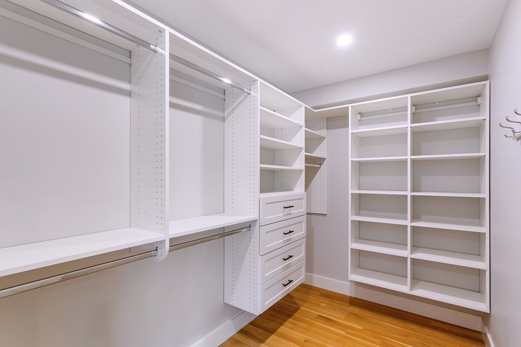 163 Atlantic Road, Unit 6 Gloucester, MA 01930 - Photo 14 of 22 a view of walk in closet with empty racks