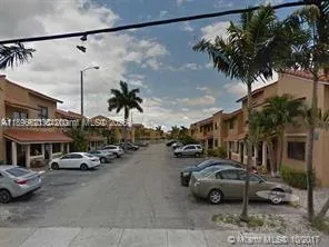 a car parked in front of a building