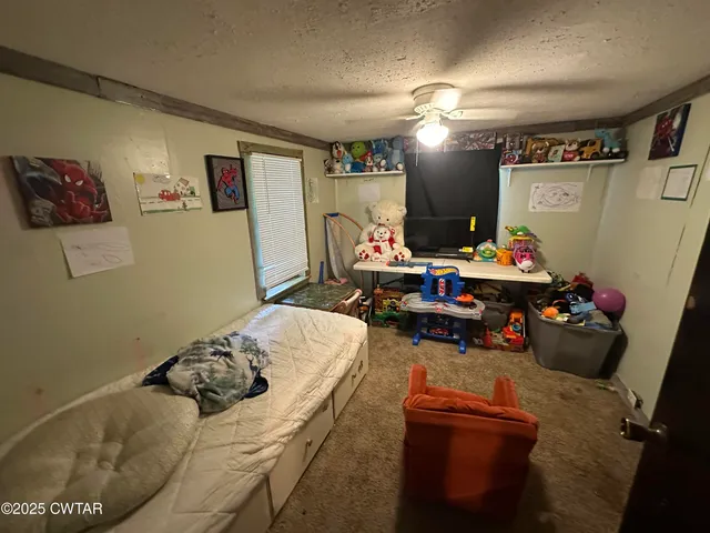 a bathroom with a sink mirror and vanity