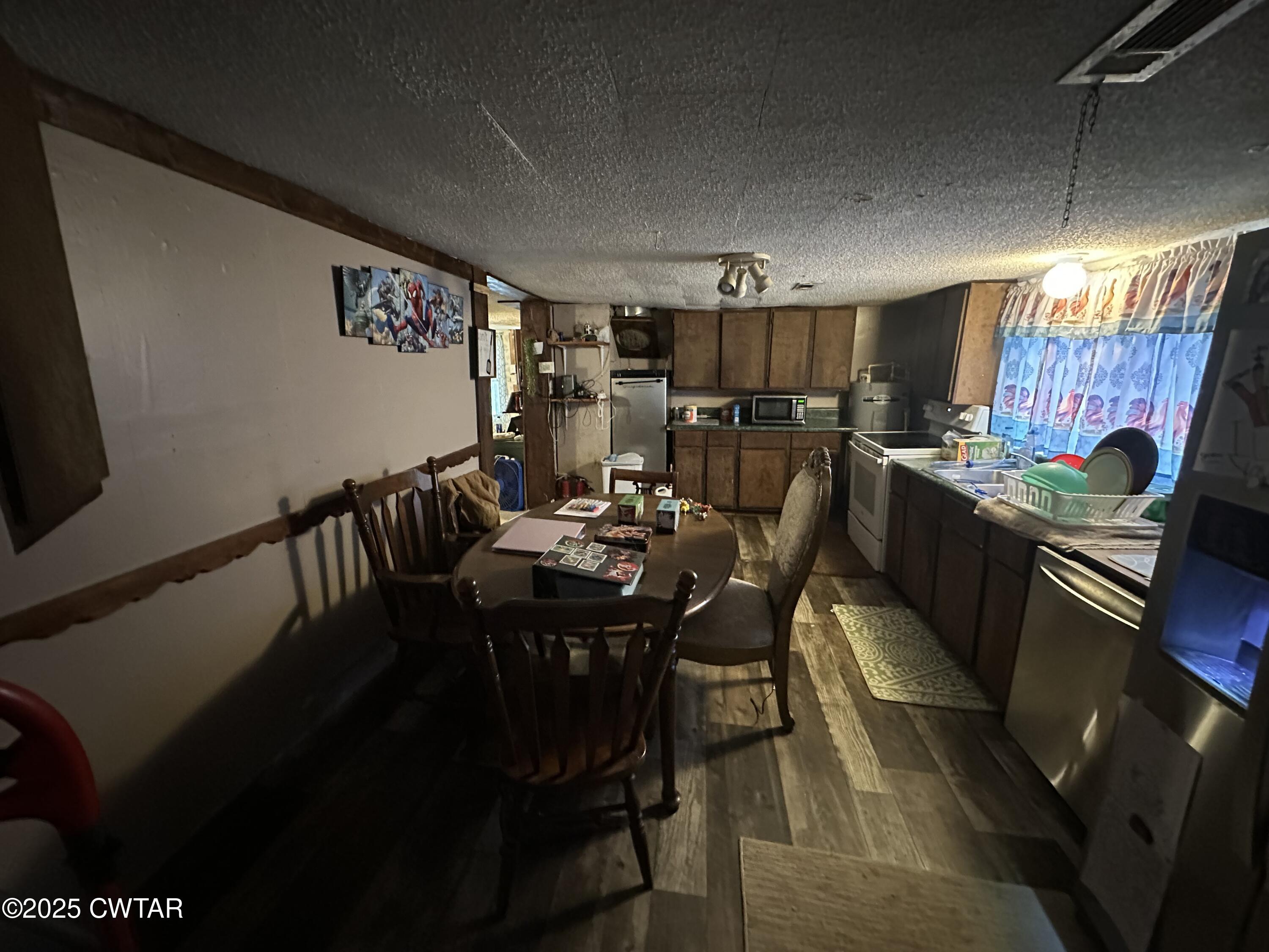 271 Fletcher Road Dyer, TN 38330 - Photo 7 of 11 a view of a dining room with furniture
