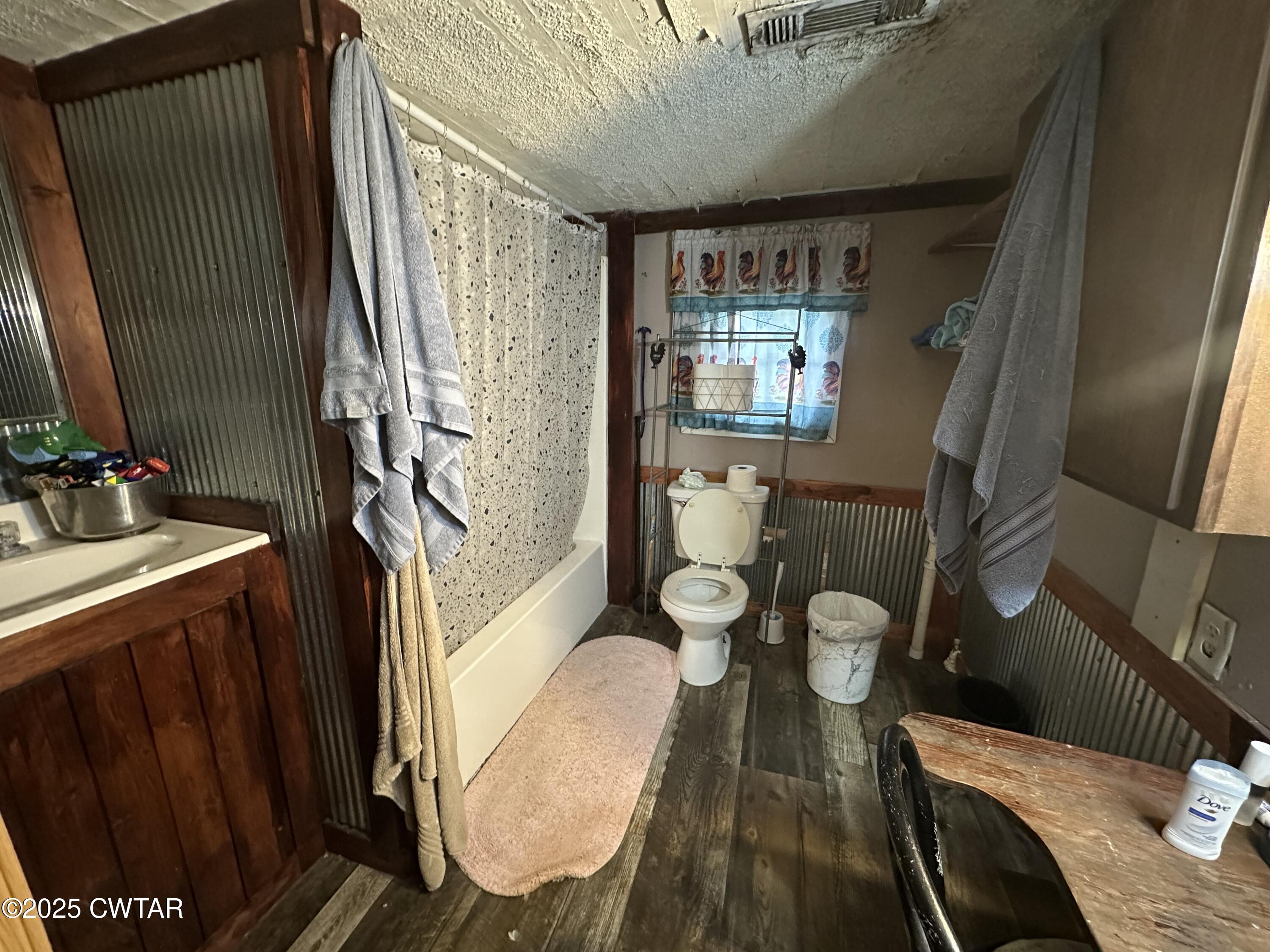 271 Fletcher Road Dyer, TN 38330 - Photo 8 of 11 a bathroom with a sink mirror and vanity