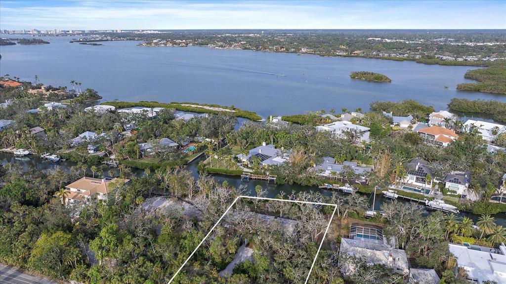 5225 Hidden Harbor Road Sarasota, FL 34242 - Photo 2 of 13 a view of a lake with a mountain in the background