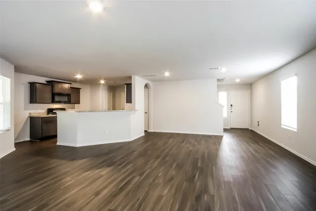 a view of a kitchen with a sink and a microwave