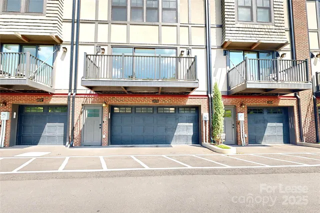 a view of brick building with large windows