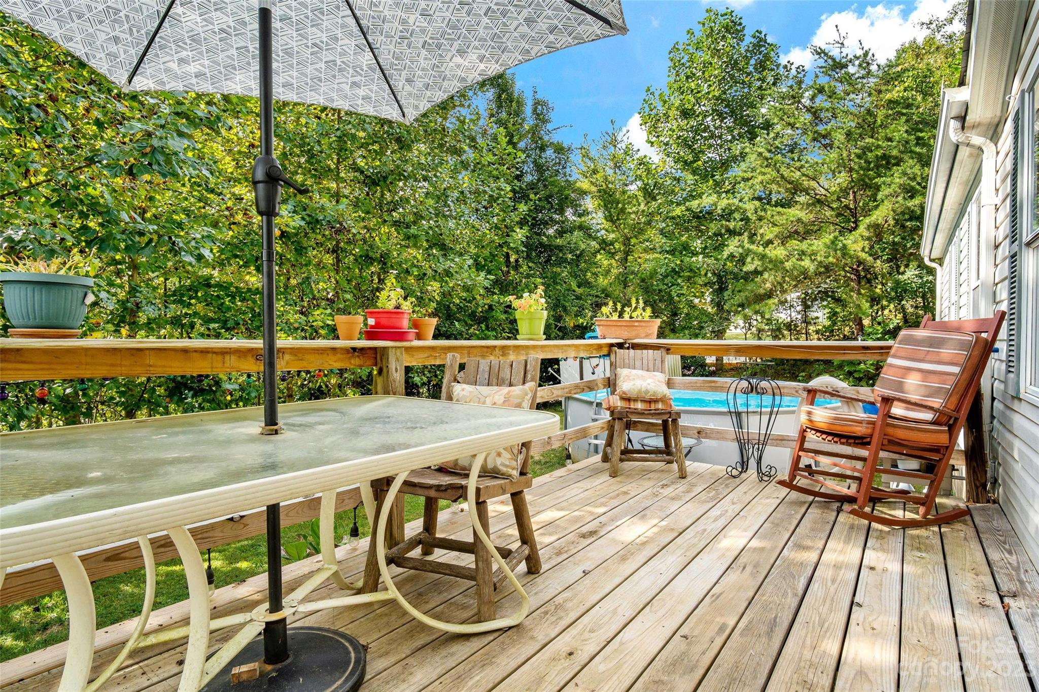 584 Ebenezer Road Old Fort, NC 28762 - Photo 5 of 41 an outdoor view from a balcony with seating space