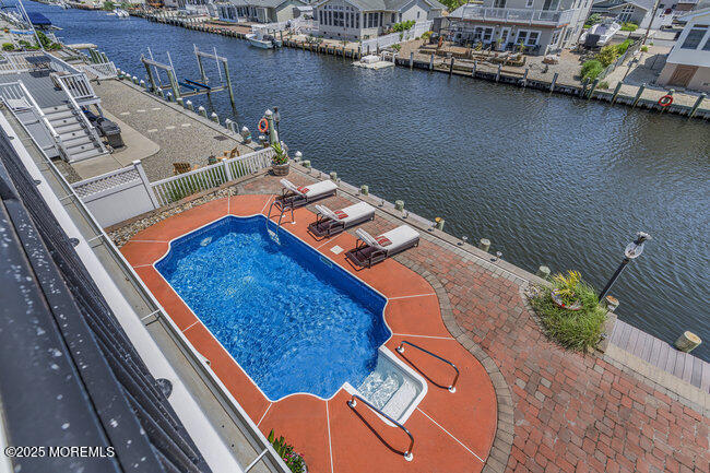 835 Anchor Drive Forked River, NJ 08731 - Photo 129 of 146 an aerial view of a house with a ocean view