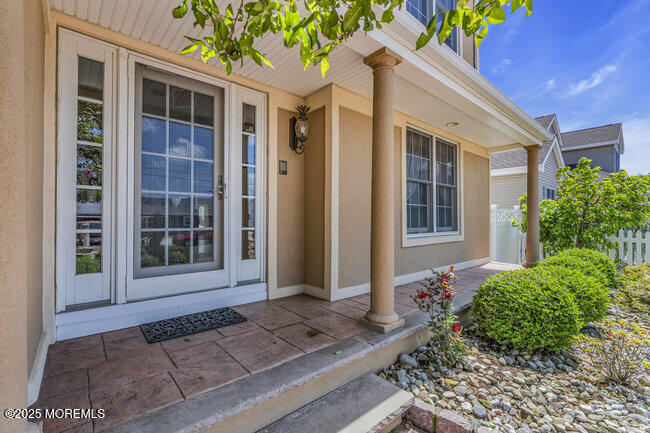 835 Anchor Drive Forked River, NJ 08731 - Photo 131 of 146 a front view of a house with a yard