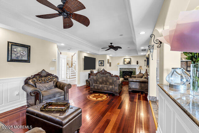 835 Anchor Drive Forked River, NJ 08731 - Photo 23 of 146 a living room with furniture and a chandelier