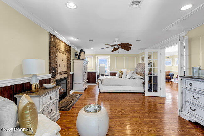 835 Anchor Drive Forked River, NJ 08731 - Photo 26 of 146 a living room with furniture and a flat screen tv