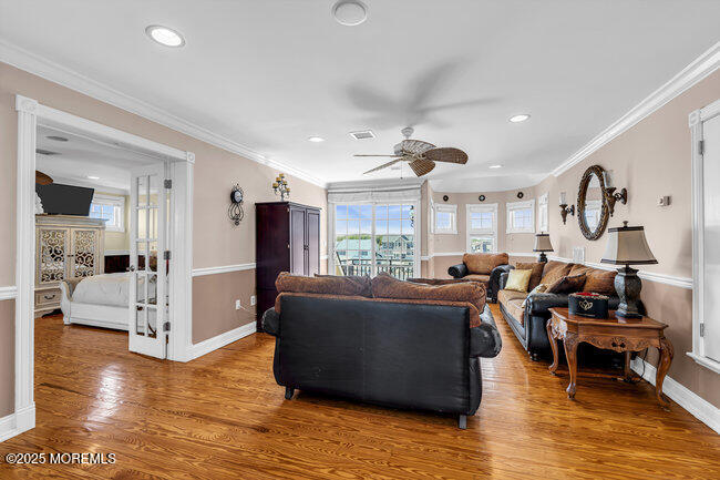835 Anchor Drive Forked River, NJ 08731 - Photo 34 of 146 a living room with furniture and a large window