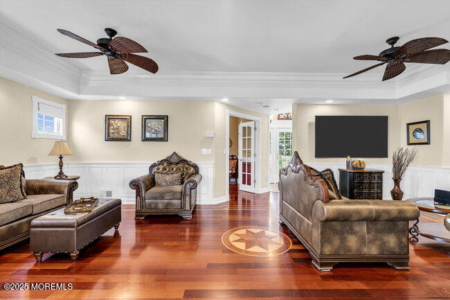 835 Anchor Drive Forked River, NJ 08731 - Photo 40 of 146 a living room with furniture and a flat screen tv