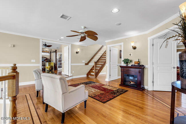 835 Anchor Drive Forked River, NJ 08731 - Photo 48 of 146 a living room with furniture and wooden floor