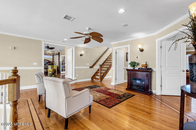 835 Anchor Drive Forked River, NJ 08731 - Photo 49 of 146 a living room with furniture and wooden floor
