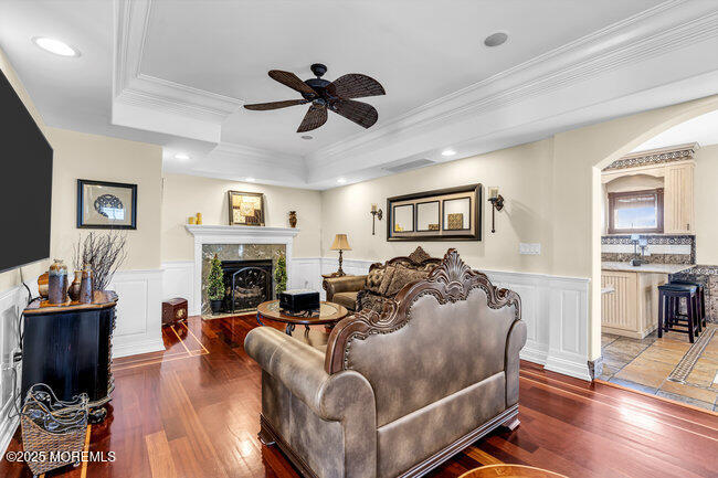 835 Anchor Drive Forked River, NJ 08731 - Photo 81 of 146 a living room with furniture and a fireplace