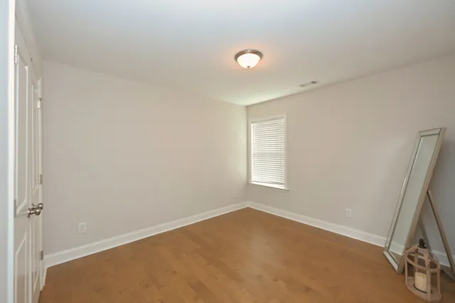 a view of a room with windows