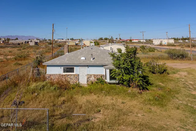 a view of a city with mountains
