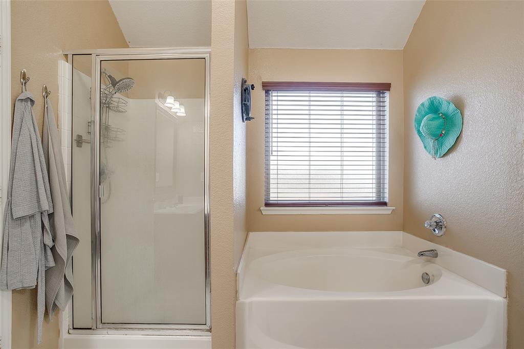 10905 Soft Shell Drive Venus, TX 76084 - Photo 16 of 21 a white bath tub sitting next to a window