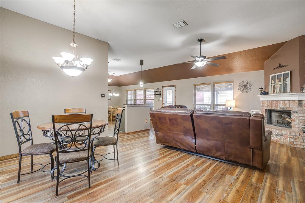 10905 Soft Shell Drive Venus, TX 76084 - Photo 8 of 21 a view of a livingroom with furniture window and wooden floor
