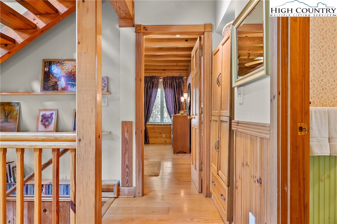 286 B Howell Road Lansing, NC 28643 - Photo 15 of 47 a view of walk in closet with clothes and shoes