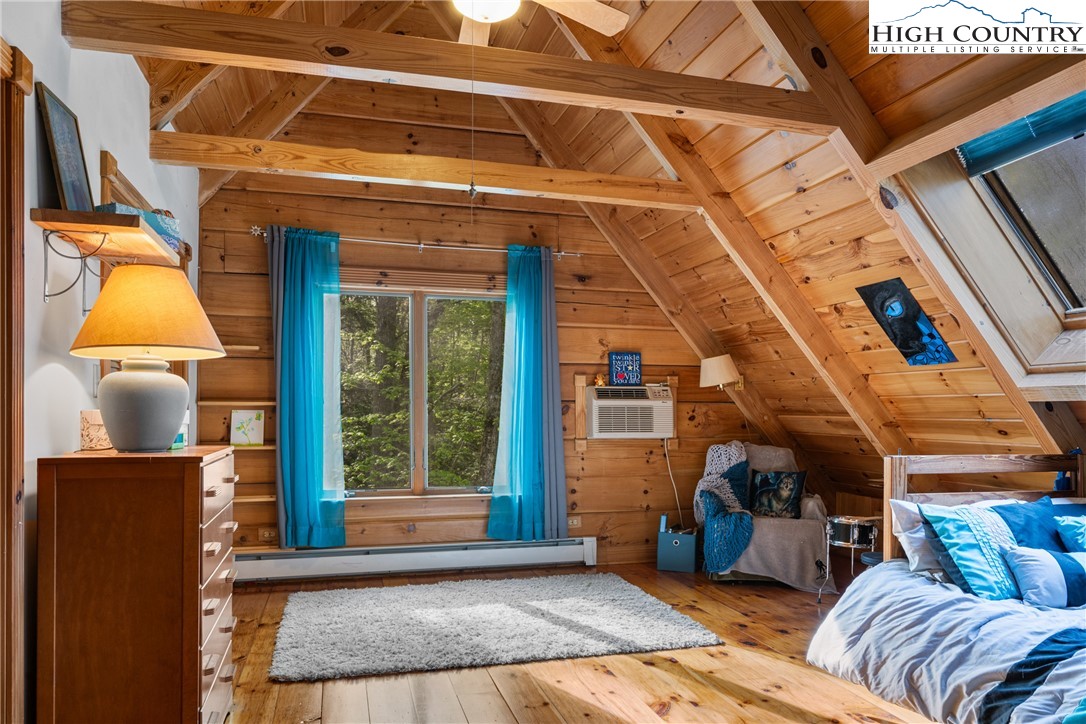 286 B Howell Road Lansing, NC 28643 - Photo 23 of 47 a view of a living room and a couch