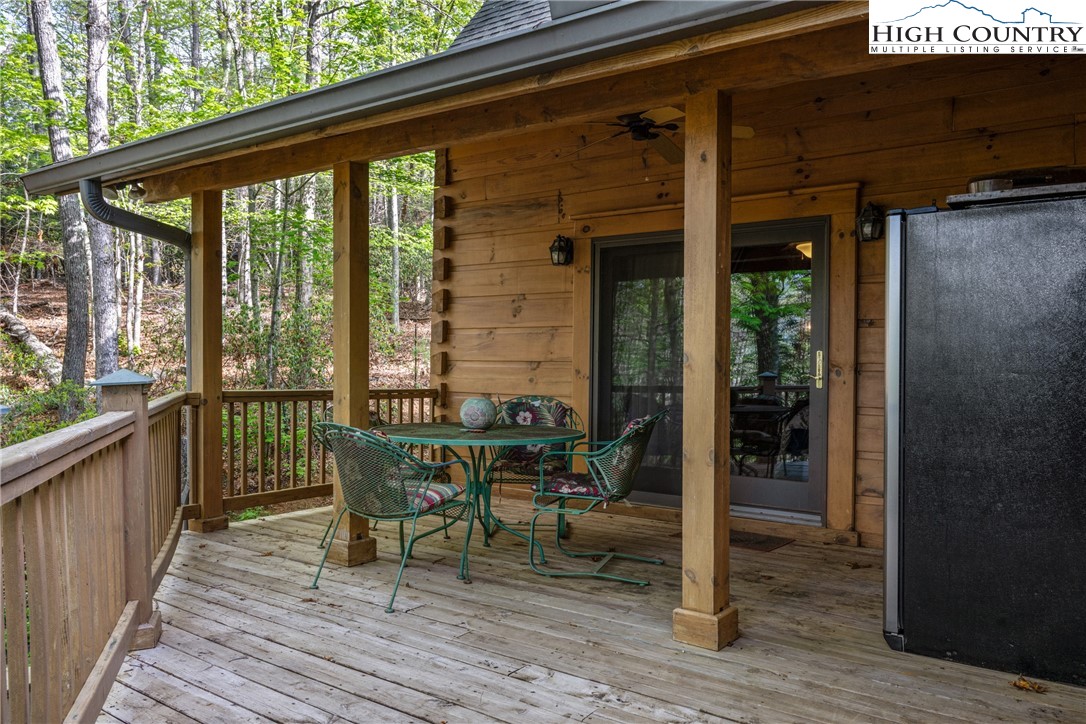286 B Howell Road Lansing, NC 28643 - Photo 37 of 47 a balcony with furniture and wooden floor