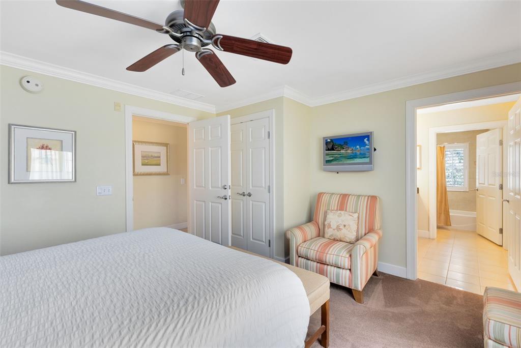 1360 Centre Ct Ridge Drive, Unit 201 Reunion, FL 34747 - Photo 18 of 29 a bedroom with a bed couch and window
