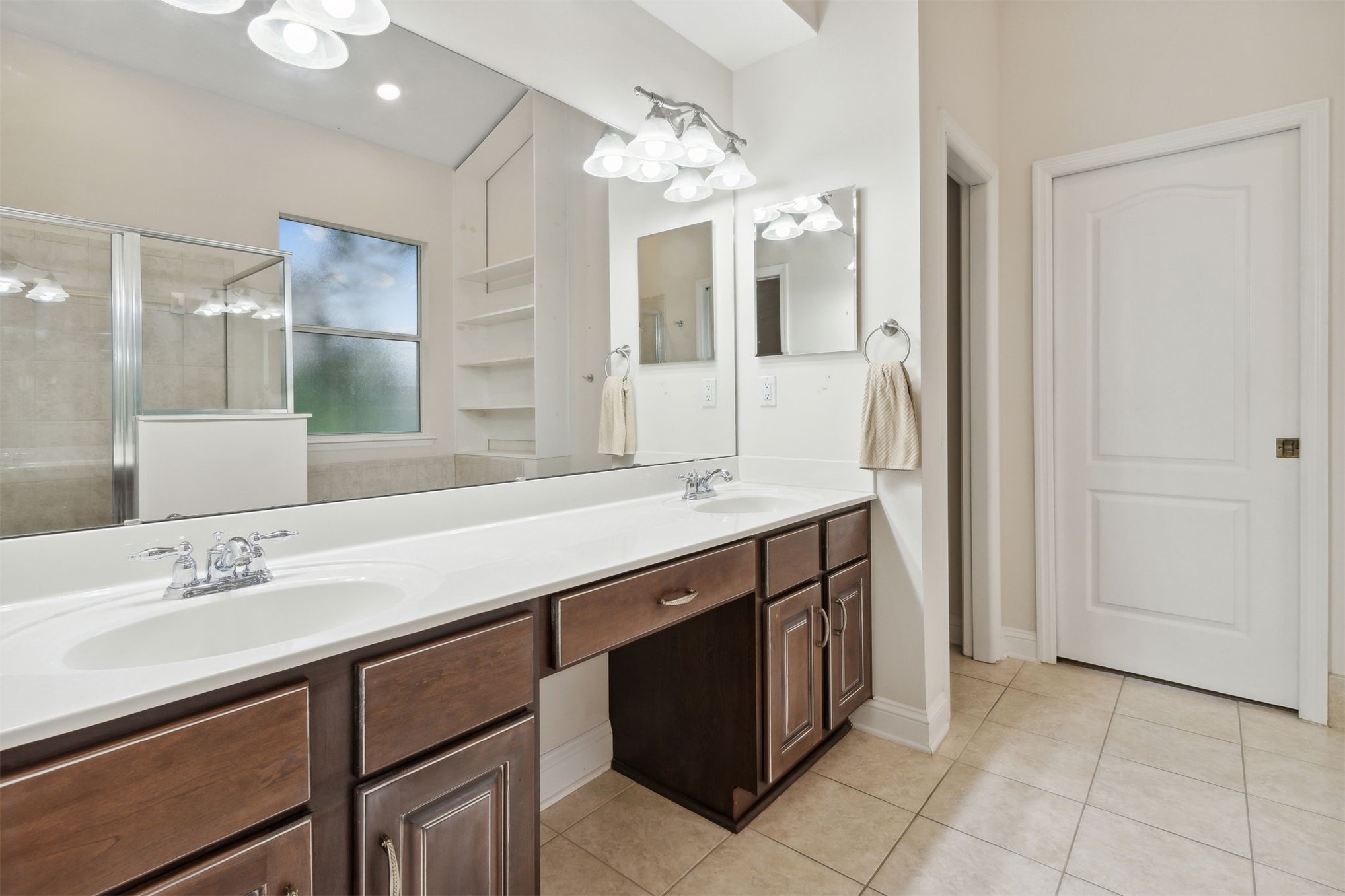563 Santa Maria Drive Fernandina Beach, FL 32034 - Photo 8 of 26 a spacious bathroom with a granite countertop sink a mirror and a