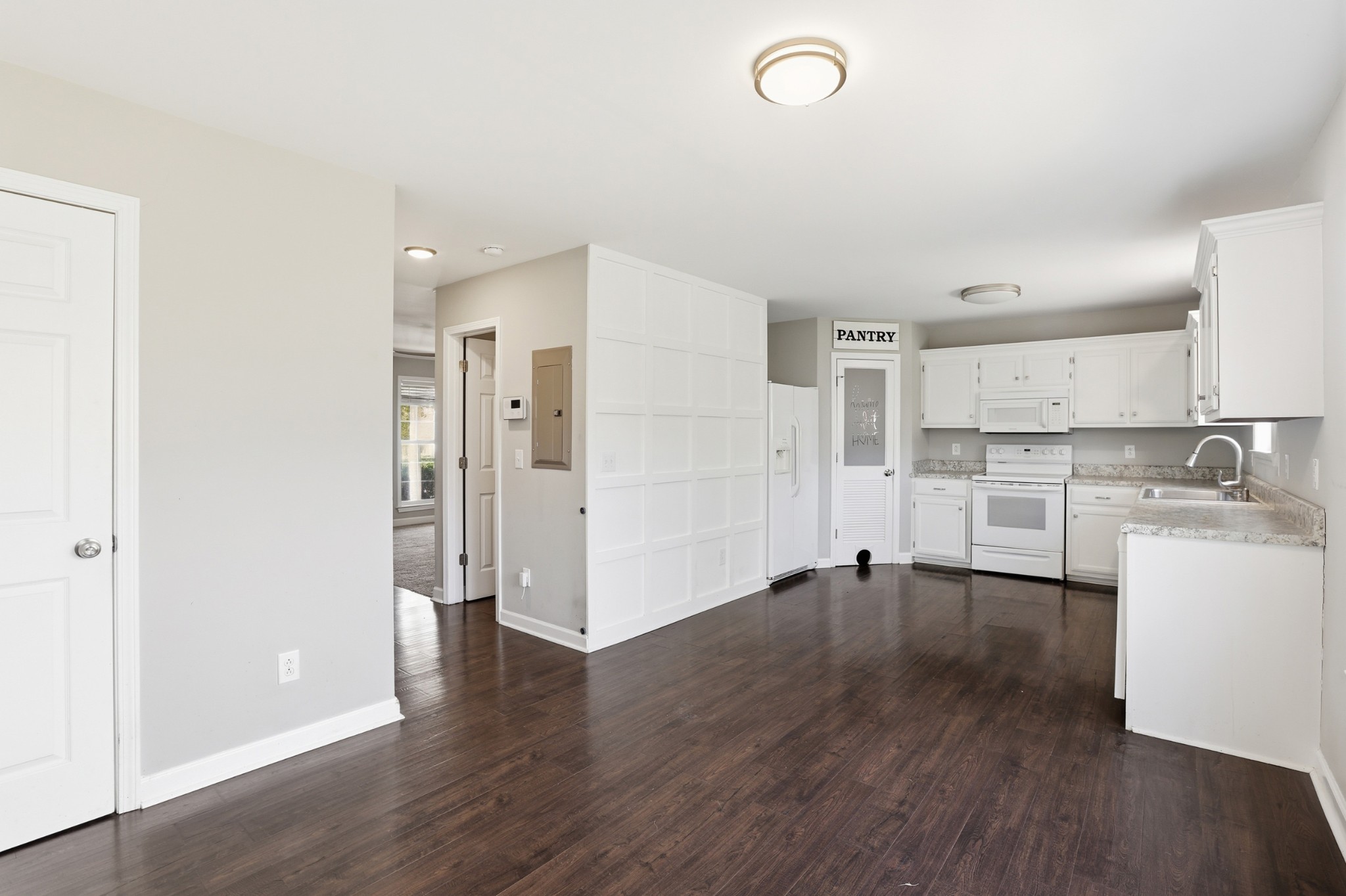 2800 Rippavilla Way Spring Hill, TN 37174 - Photo 13 of 30 a view of a kitchen with wooden floor and electronic appliances
