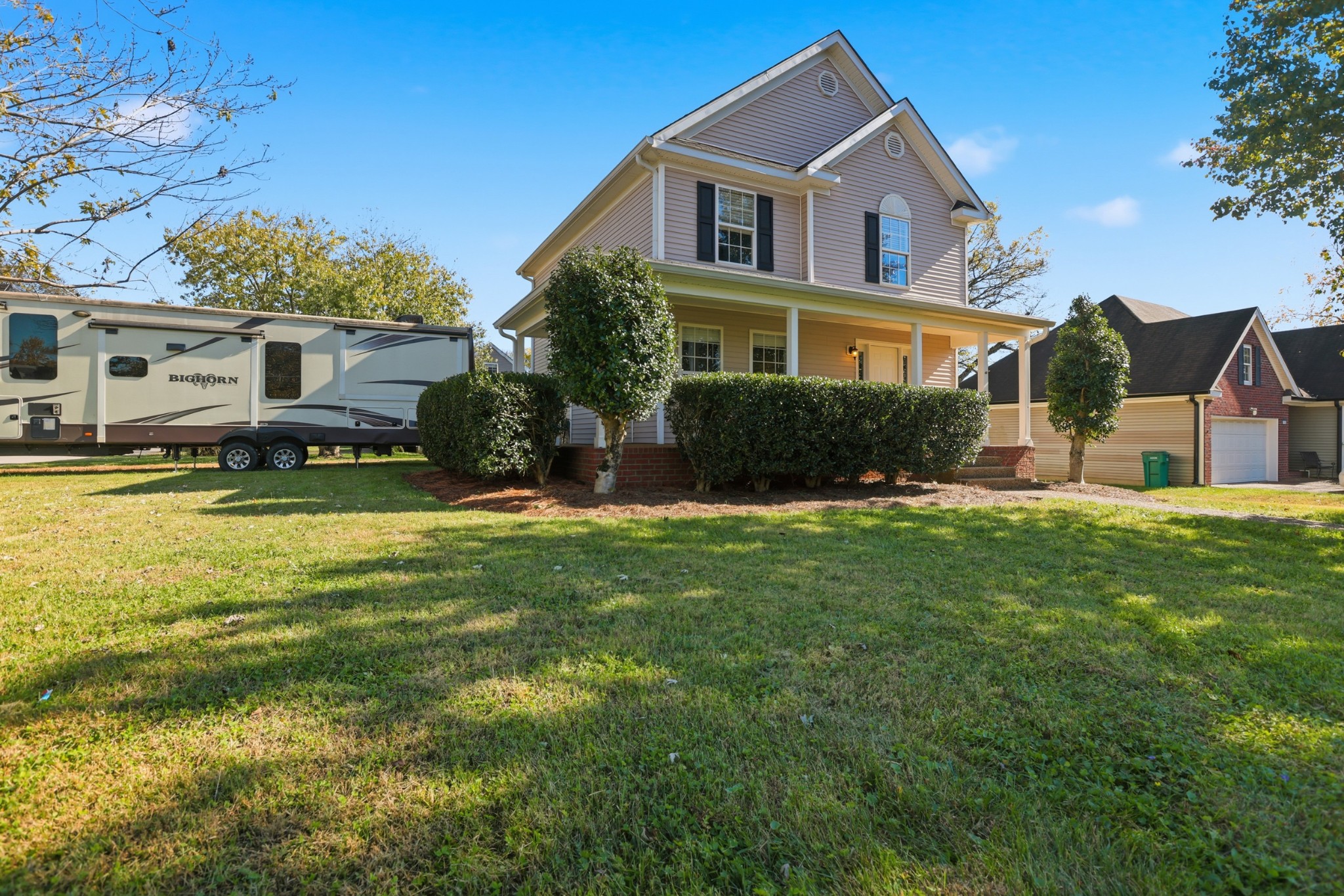 2800 Rippavilla Way Spring Hill, TN 37174 - Photo 4 of 30 a front view of a house with a yard and garage