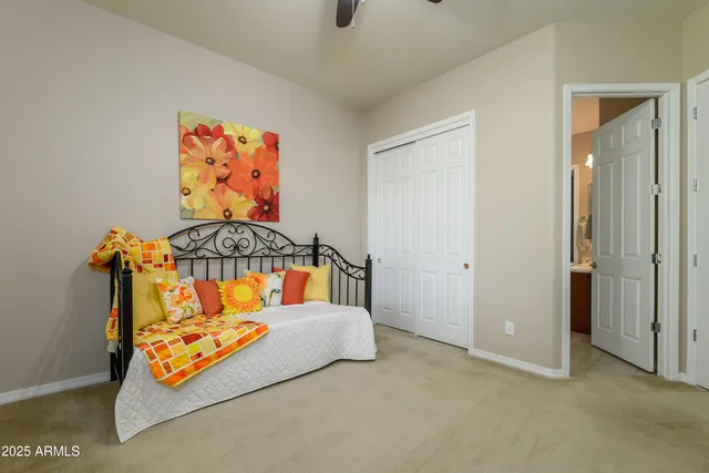 a bedroom with furniture and a bed