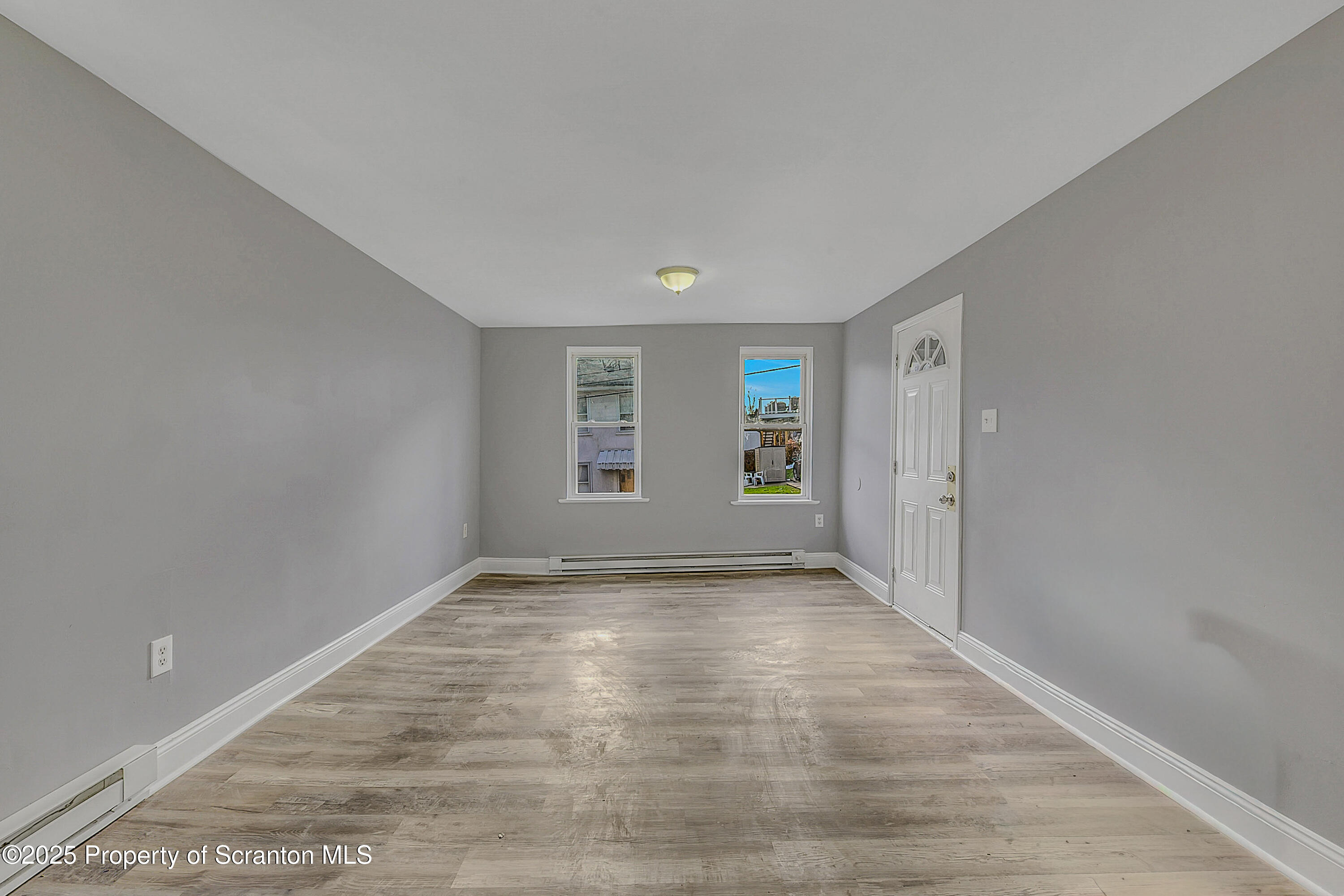 916 West Linden Street, Unit 1 Scranton, PA 18504 - Photo 7 of 19 a view of an empty room and window