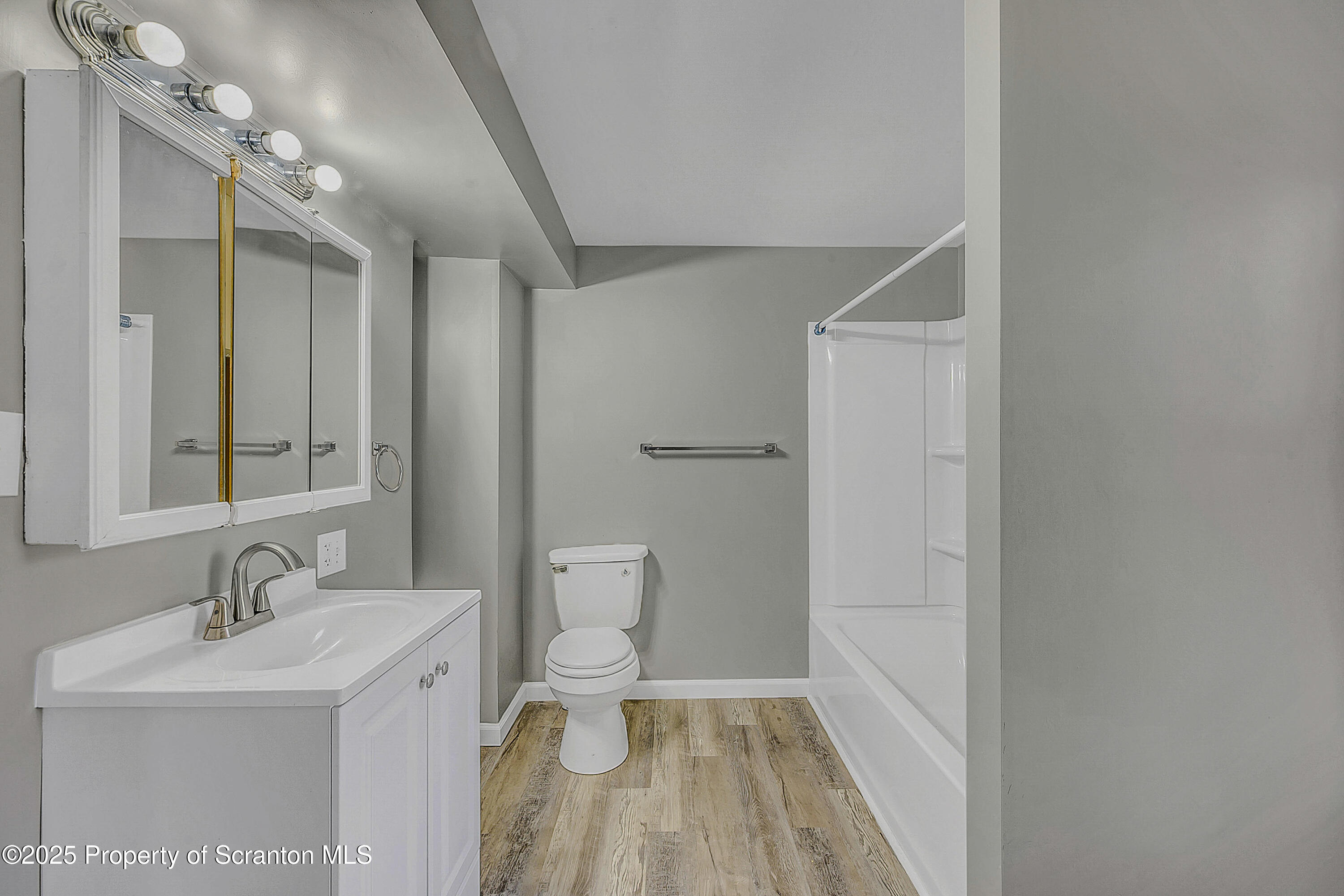916 West Linden Street, Unit 1 Scranton, PA 18504 - Photo 10 of 19 a bathroom with a sink toilet and shower
