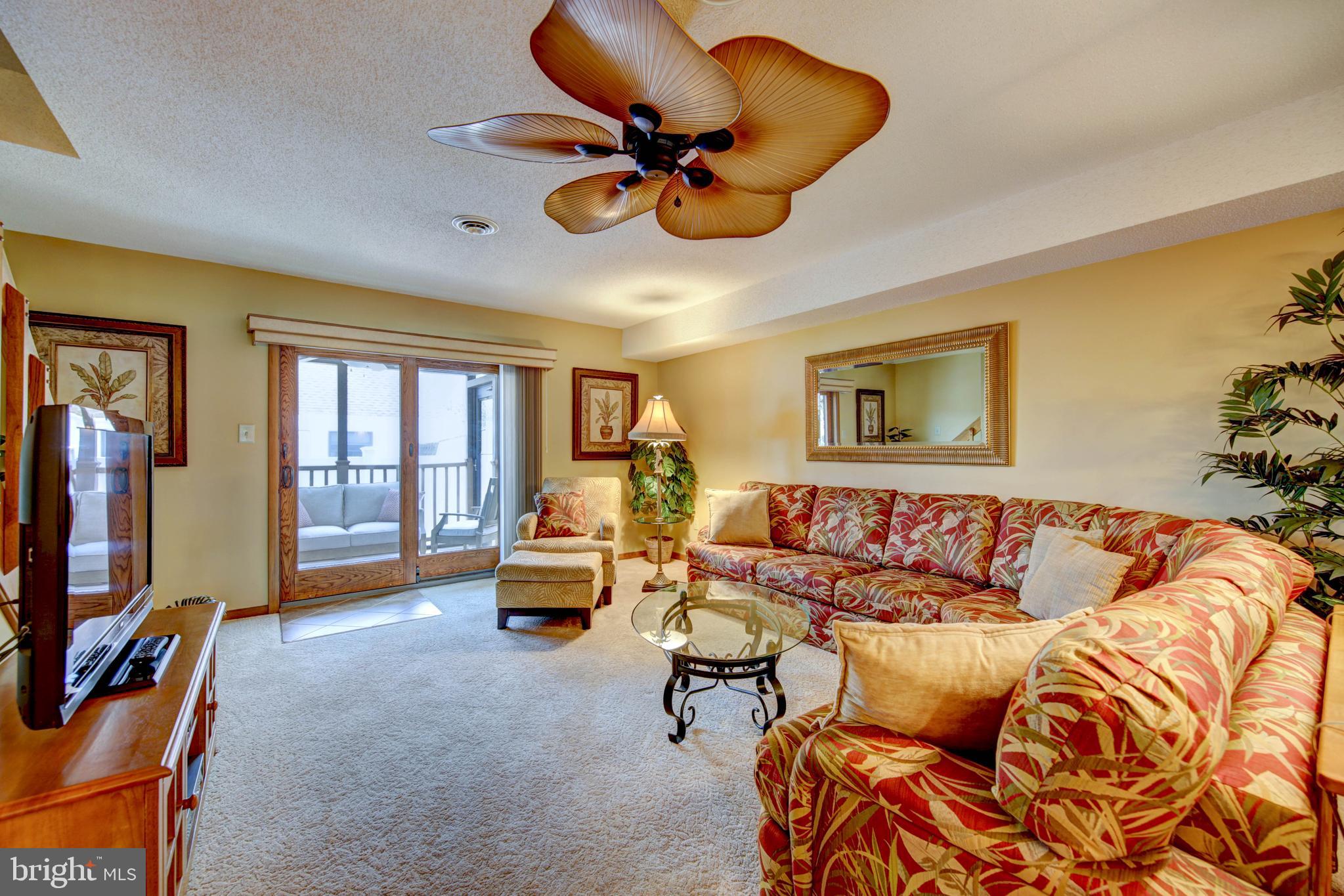 13800 Barge Road, Unit 7 Ocean City, MD 21842 - Photo 12 of 28 Living room with slider to porch