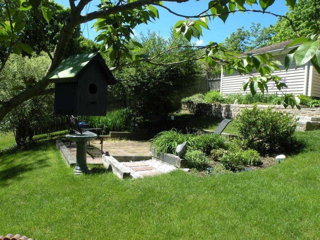 68 Winding Way Portland, ME 04102 - Photo 18 of 34 Birdhouse and patio beyond