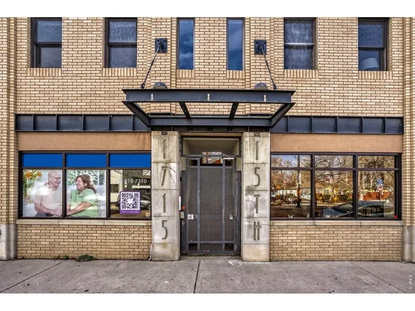 a view of brick building with a entrance