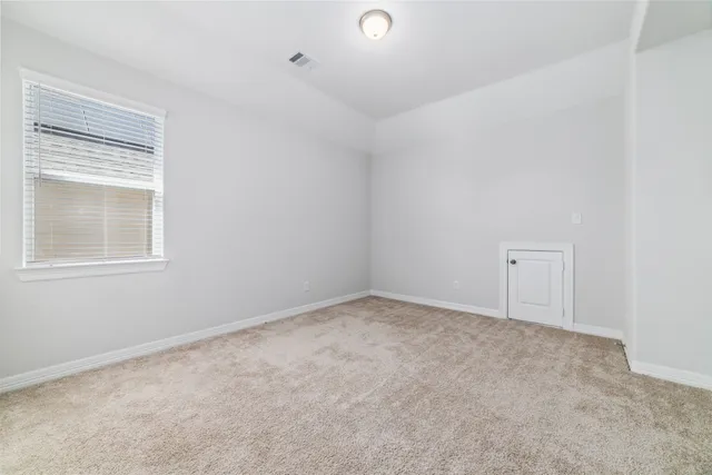 an empty room with a window