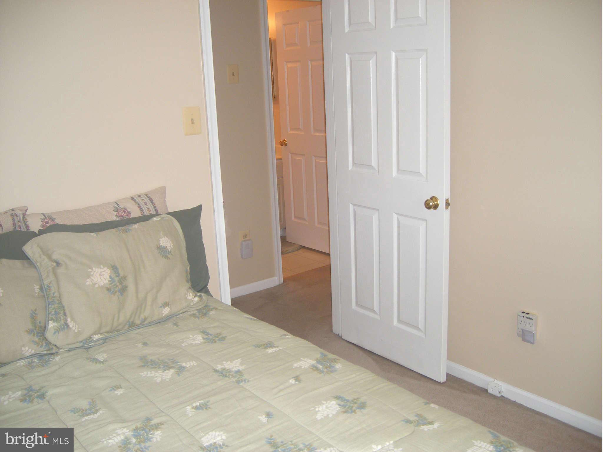 7785 Paddock Way Baltimore, MD 21244 - Photo 17 of 30 a view of a bedroom with bed