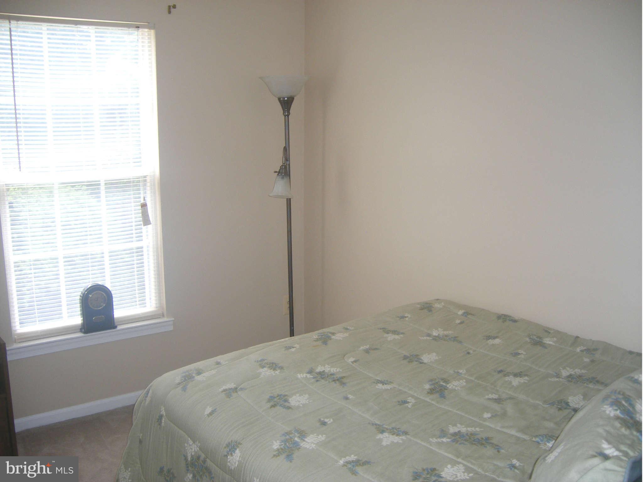 7785 Paddock Way Baltimore, MD 21244 - Photo 18 of 30 a view of a window in an empty room