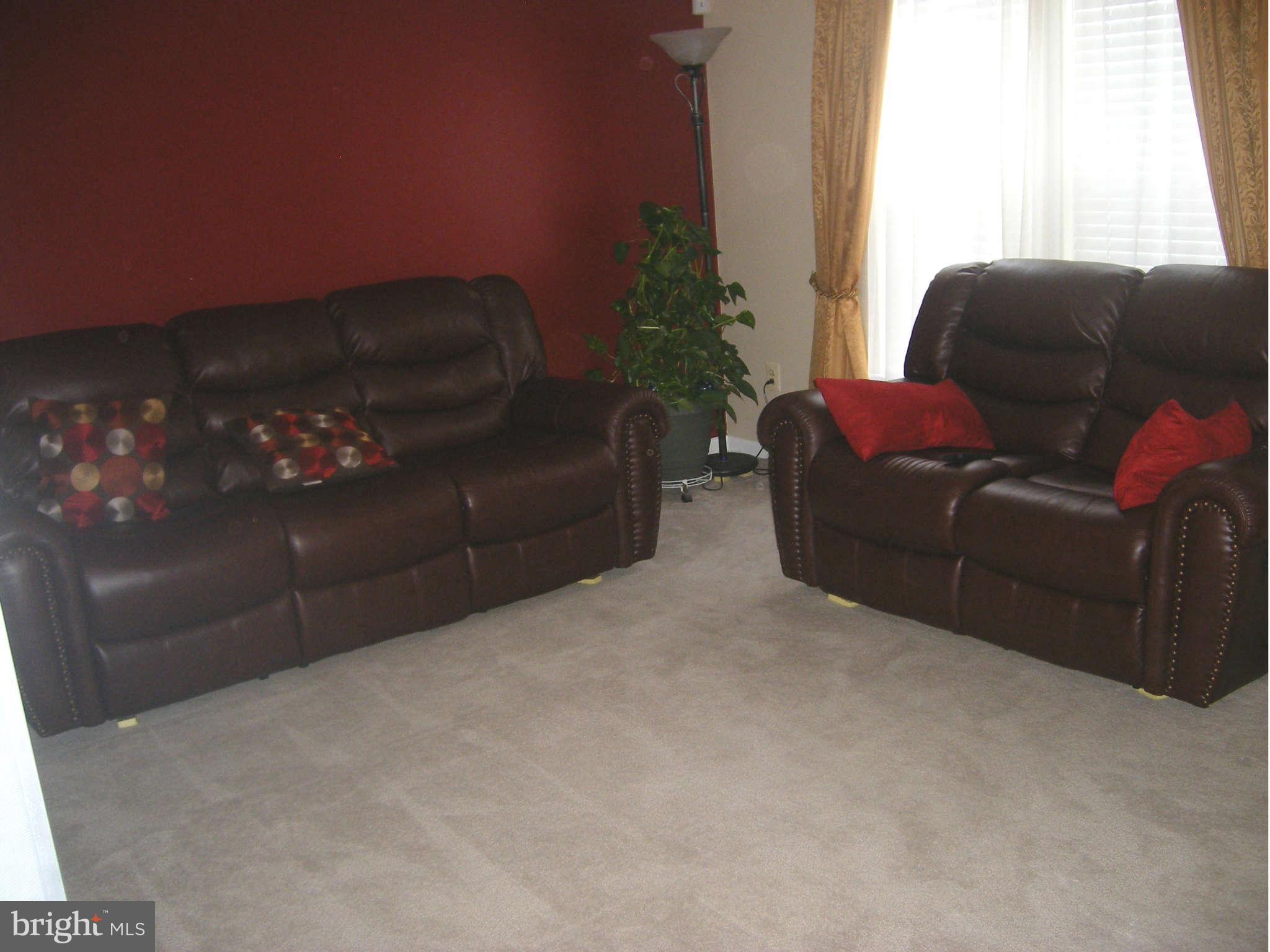 7785 Paddock Way Baltimore, MD 21244 - Photo 23 of 30 a living room with furniture and a window