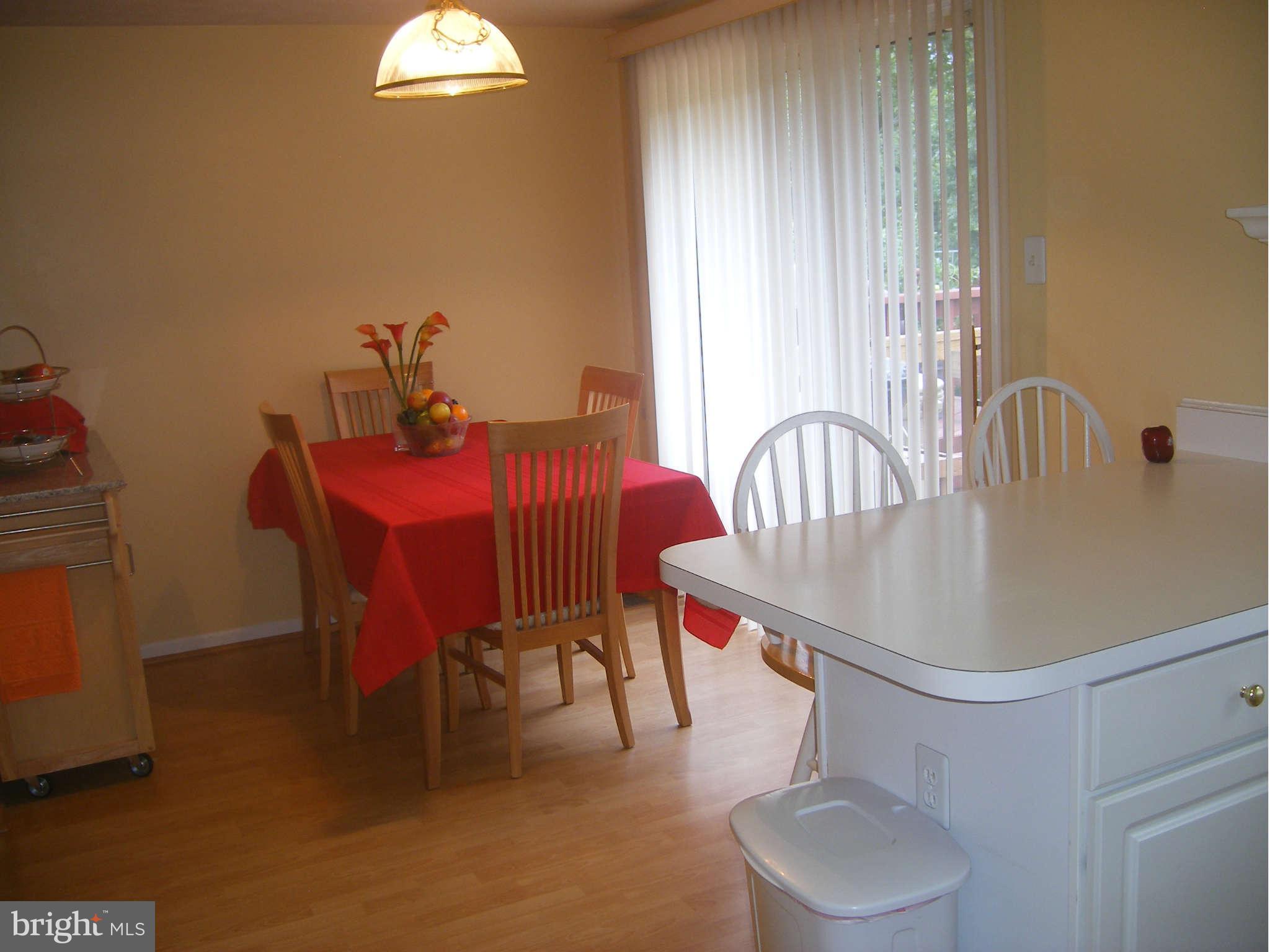 7785 Paddock Way Baltimore, MD 21244 - Photo 25 of 30 a dining room with furniture and window