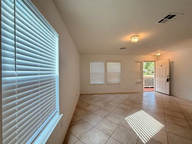 a view of a room with windows