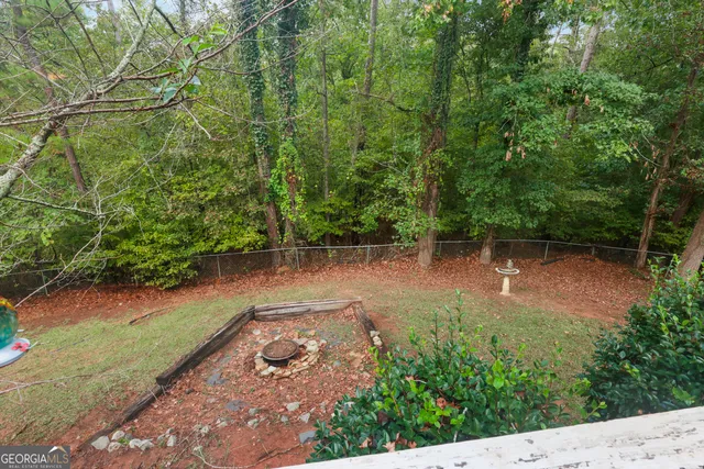 a view of a lake with a yard